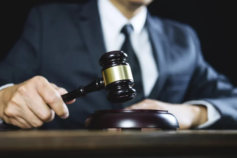 Counselor,Or,Male,Lawyer,Working,On,Courtroom,Sitting,At,The